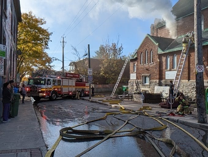 OFSFirePhoto's tweet image. Ottawa Fire on scene of a 2-Alarm fire at St. Lukes Anglican Church on Somerset ST West at Bell ST North. Crews have water on the fire and are opening up the interior walls. #ottnews #OttFire #Ottawa