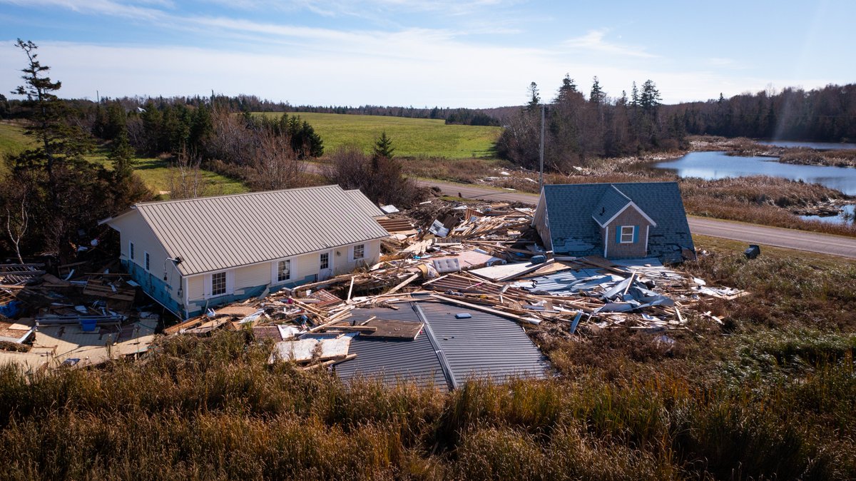 CBCshaner's tweet photo. Clean up continues around the Island, here are some shots from St Peters Bay, McEwens Island and Naufrage. I find something eerie with the picnic table photo. https://t.co/vFUNZ4zIjT