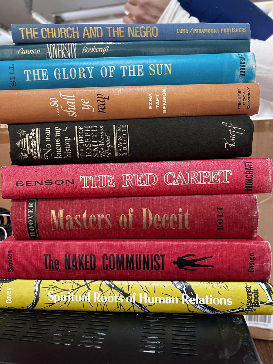 dinger_john's tweet image. One of these things is not like the others. My in-laws are cleaning out their dad’s house and asked if I wanted any of these. He was a true Benson Mormon, but I’m pleasantly surprised to see Brodie snuck in there. Hopefully he wrote in the margins.