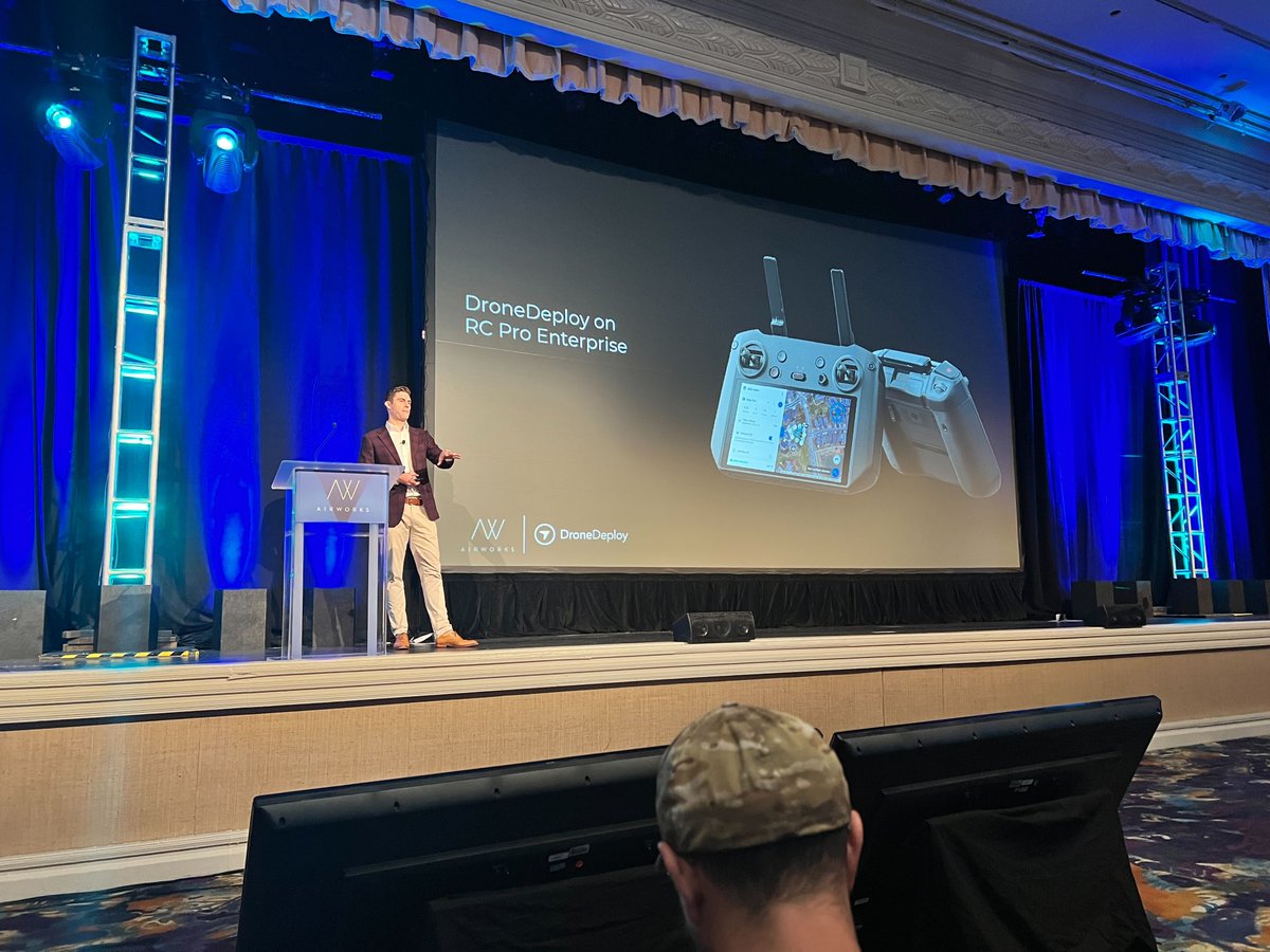 DroneDeploy's tweet photo. Our VP of Product James Pipe is on stage at @DJIGlobal Airworks 2022 sharing DroneDeploy's vision for the future of reality capture and exciting news on our support for the Mavic 3 Enterprise and DJI Dock 🚀

#realitycapture #drones #DJI #automation #DJIAirWorks2022 https://t.co/u2u6Ng0lmq