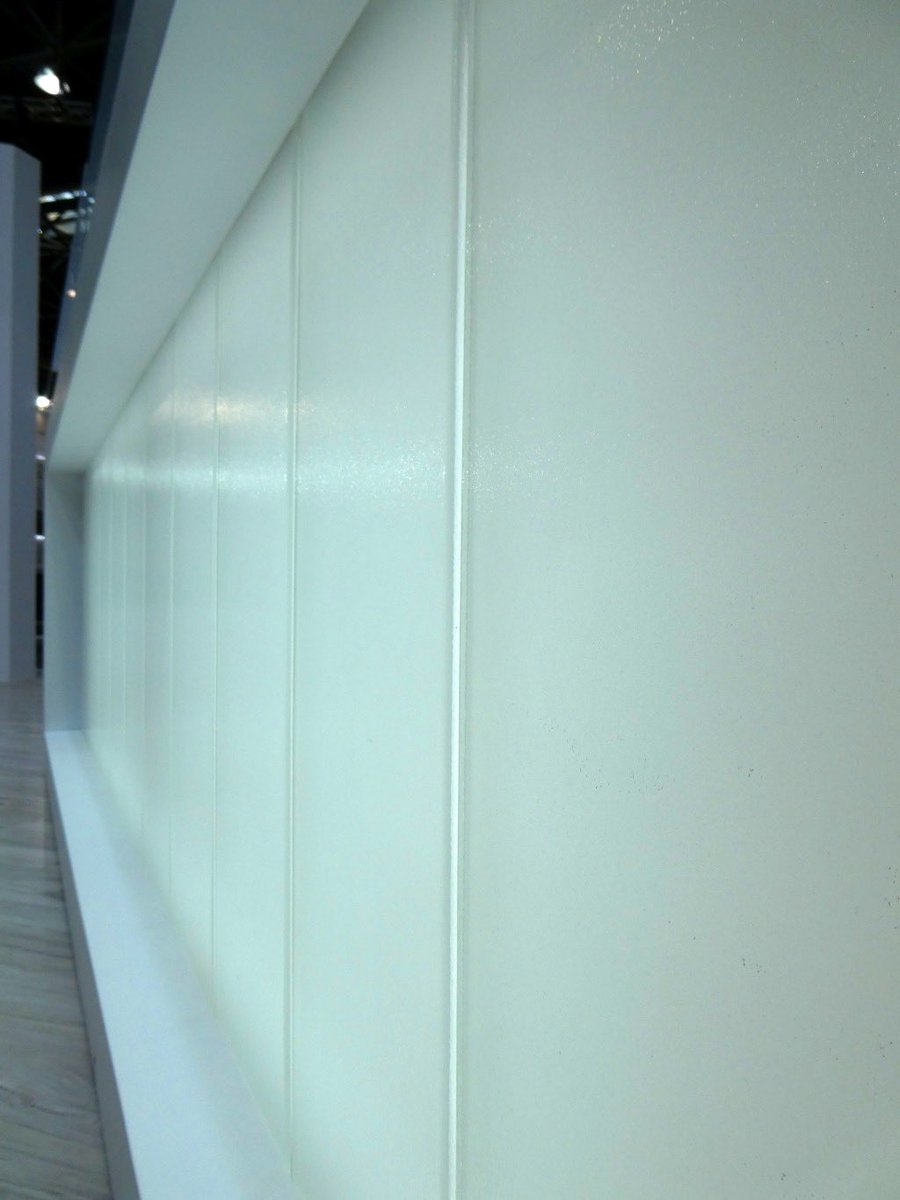 pilkingtonglass's tweet photo. At our Glasstec booth we presented Pilkington 𝐏𝐫𝐨𝐟𝐢𝐥𝐢𝐭™ OW Opal extra clear channel glass with sandblasted surface.
It was installed as the front side glazing of our reception desk and lit from the back.
#glass #channelglass #profiledglass #interiordesign #design https://t.co/8PzTrC3RHB