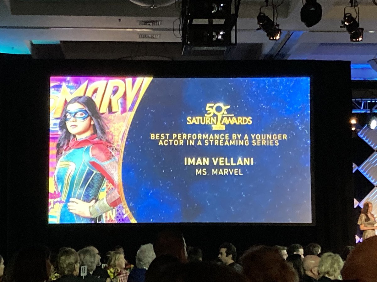 MsMarvelNews's tweet photo. Iman Vellani has won her first award (Best Performance by a Younger Actor in Streaming) for her role as Kamala Khan/Ms. Marvel at the Saturn Awards. https://t.co/t9xjE3VAPe