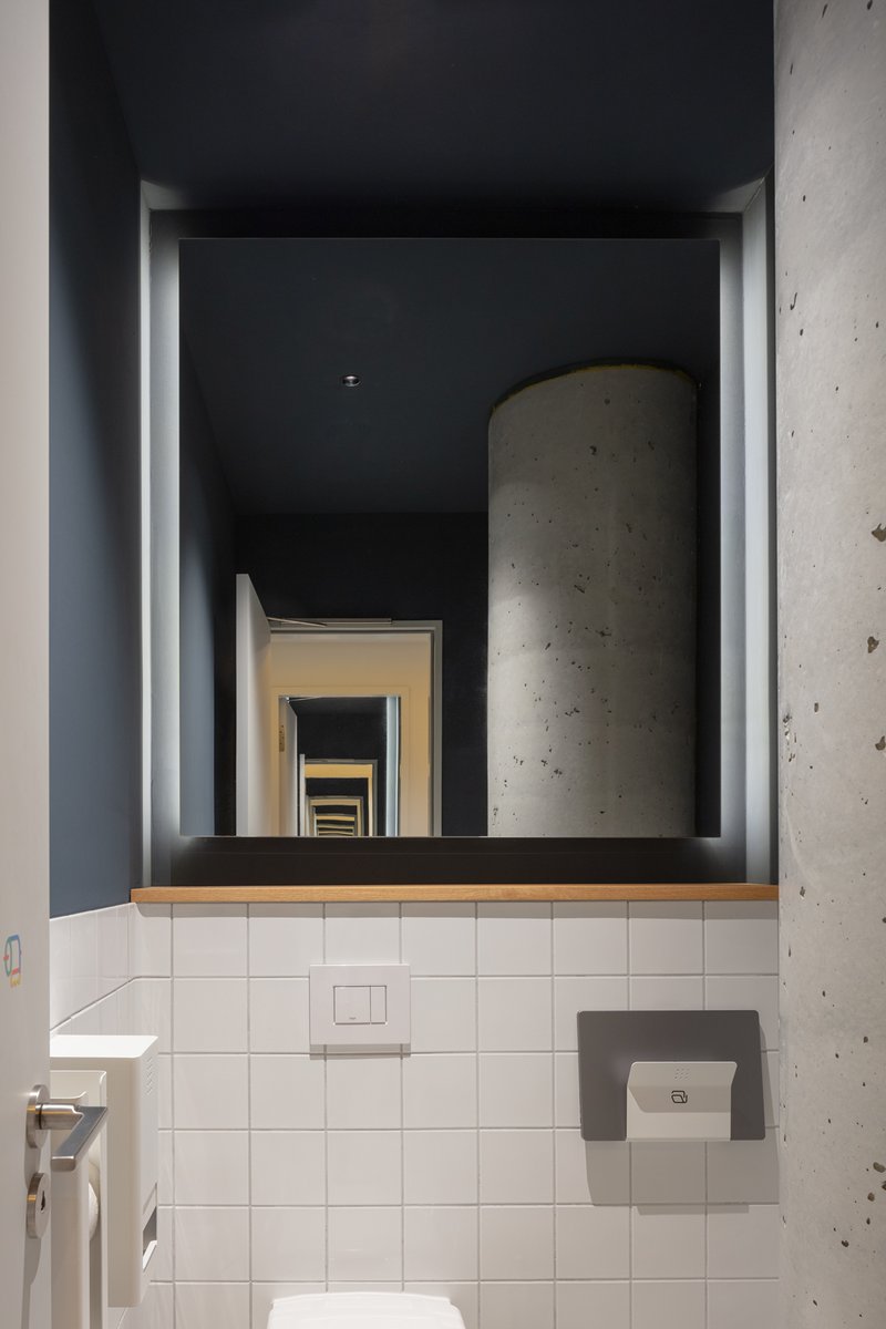 Our washrooms for our new workplace project <a href="/contentful/">Contentful</a> berlin. Individual cabins for optimal privacy. This space is layered with natural wood and curved tiles to soften the interior.

Photography: Koy + Winkel