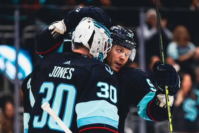 Sprong and Martin Jones hugging after home win