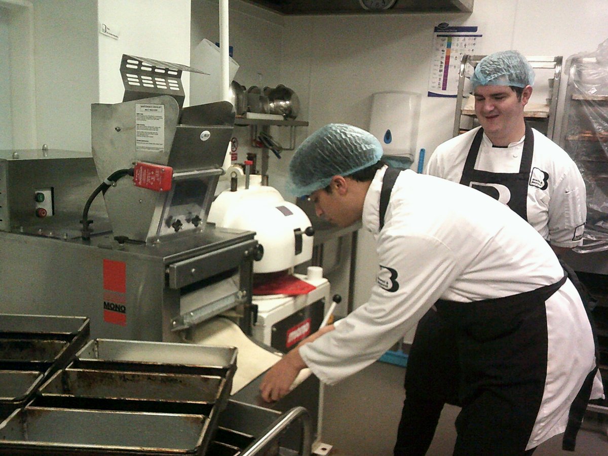 breadbeyondUK's tweet photo. Our (new to us) bread moulding machine takes dough and moulds it to the loaf size needed. 
So bakers with sensory issues or cannot apply much pressure with two hands can be involved in bread production.
Daniel saw the machine used once and then made 20 loaves independently! https://t.co/Brf5mLsSfY