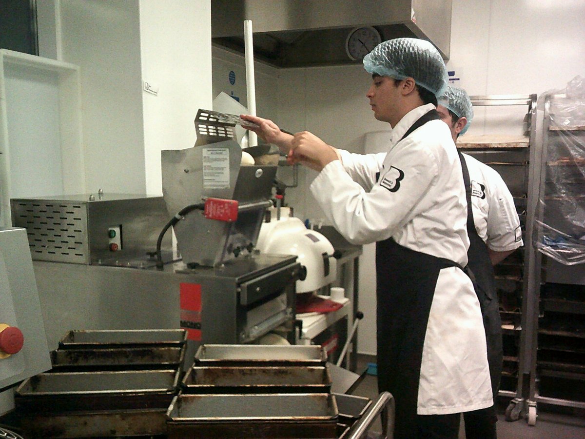 breadbeyondUK's tweet photo. Our (new to us) bread moulding machine takes dough and moulds it to the loaf size needed. 
So bakers with sensory issues or cannot apply much pressure with two hands can be involved in bread production.
Daniel saw the machine used once and then made 20 loaves independently! https://t.co/Brf5mLsSfY