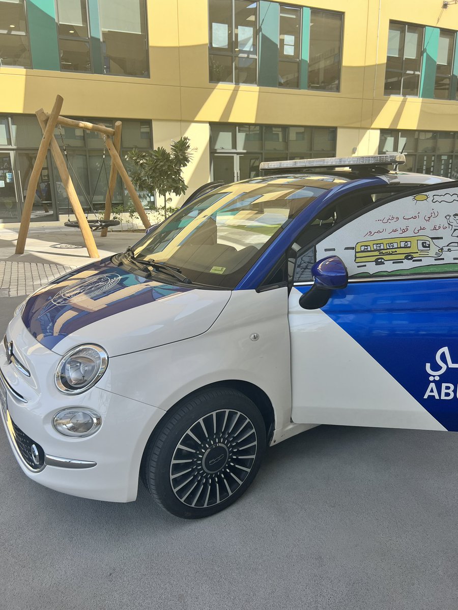 We had the AD Police visit us today for a safety talk. Can you guess who jumped into the car first to put the lights and sirens on?