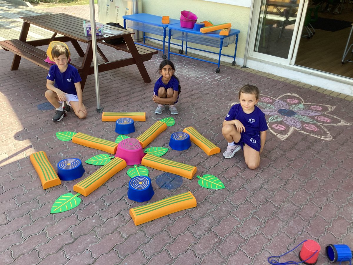 JESSJumeirahYR2's tweet photo. We have been creative by making rangoli patterns for Diwali using chalk and our outdoor equipment #JESSJumCreativity #JESSBelonging https://t.co/JzJy5ibnwe