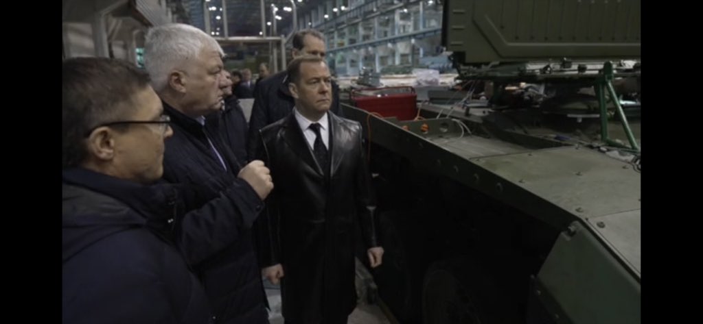 maxseddon's tweet photo. Major sartorial escalation from Medvedev, who visited the Uralvagonzavod tank factory in this leather trench coat https://t.co/ovfi3wZKv8
