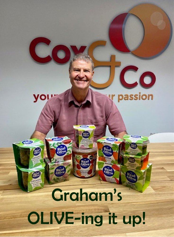 CoxPayroll's tweet photo. Our super payroller Graham is 'olive the moon' to receive a tasty treat from our client @RealOlive today.  Thank you for thinking of us @RealOlive - we can't wait to tuck in. https://t.co/ItQTo9kqRv
