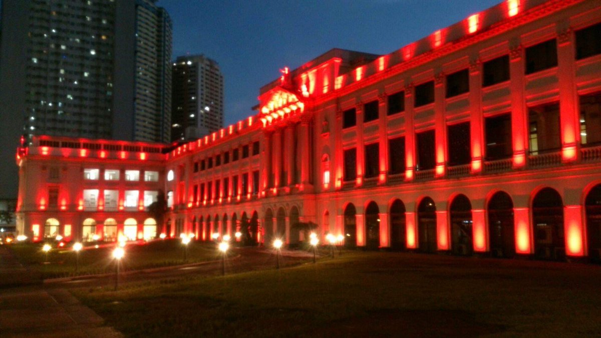 DLSUManila's tweet photo. St. La Salle Hall lights up in red in commemoration of World Polio Day. De La Salle University joins Rotary International in its global call to raise awareness on polio eradication. https://t.co/9CBpL0L9Is