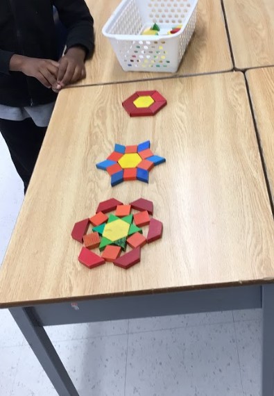We created rangoli designs using pattern blocks. Happy Diwali!