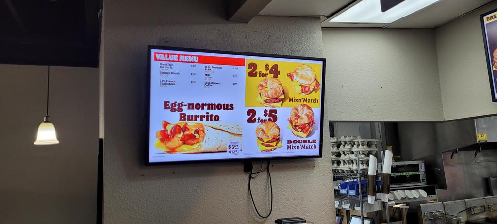 Vodprod's tweet photo. So this is what we're doing, @BurgerKing? Inflation? Haven't been to BK in a while, I walk in and see the 2 for $5 sign and get hit with the 2 for $6? How? https://t.co/CbFGYaghrq