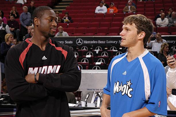 Sixteen years ago today, former @MarquetteMBB teammates Dwyane Wade (@DwyaneWade) and Travis Diener (@DienerTravis) visit before the Miami Heat (@MiamiHEAT) take on the Orlando Magic (@OrlandoMagic) at the TD Waterhouse Centre on October 24, 2006 #mubb