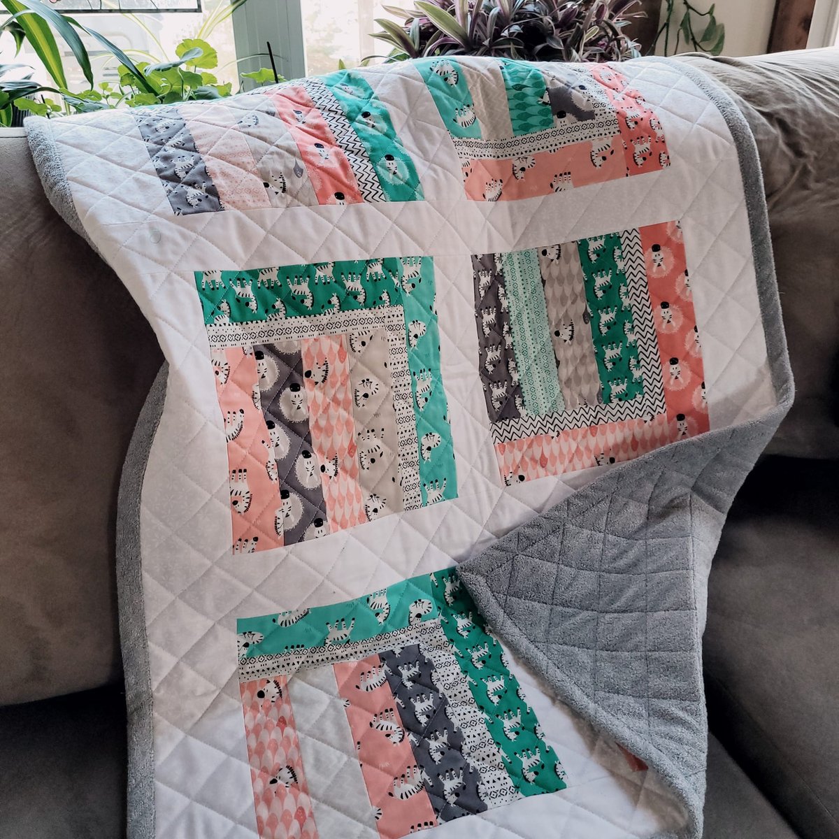 A sweet play mat or cuddle blanket for babies and toddlers would make a lovely Christmas gift. Zebras are included! This and other baby quilts available at Etsy.com/ca/shop/Sleepy…, <a href="/pfaff/">PFAFF® North America</a>, <a href="/CamelotFabrics/">Camelot Fabrics</a>, <a href="/FABRICVILLE/">FABRICVILLE INC</a>, <a href="/ModaFabrics/">ModaFabrics</a>, @Guetermann, <a href="/centreforcraft/">Centre for Craft NS</a>, <a href="/ILOVELOCALHFX/">ilovelocalhfx</a>