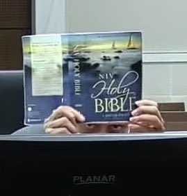 LaurenRock's tweet photo. Judge Dorow: The record should reflect that Mr Brooks is ignoring the court and reading a Bible. It should be noted for the court, I have not seen him flip a single page. 

Darrell Brooks: https://t.co/BDiqYuUMw9