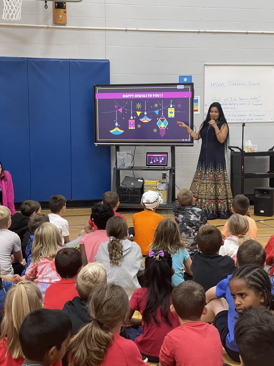 Mrs_Sarah_Kirby's tweet photo. We had a WONDERFUL assembly this morning featuring one of our amazing parents! She took the time to present information about Diwali and teach our students! 🪔 #jces #olsd https://t.co/iGXbBlC9n8