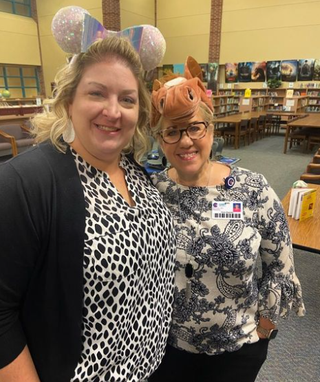 MitchellCISD's tweet photo. Mrs. Klapesky & Mrs. Johnson are putting a cap on drugs & bullying. #mitchellcisd #redribbonweek22 @mitchellmustangspto @conroeisd https://t.co/rhn0fJH36a