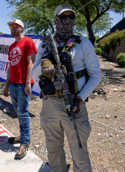 SeditionHunters's tweet photo. #AZProblemChild Aug 13, 2022 Armed Trump supporters gather outside FBI office in Phoenix, AZ to protest Mar-a-Lago raid. https://t.co/xyYxISx71b