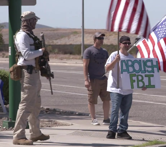 SeditionHunters's tweet photo. #AZProblemChild Aug 13, 2022 Armed Trump supporters gather outside FBI office in Phoenix, AZ to protest Mar-a-Lago raid. https://t.co/WPrKpfWsOH https://t.co/5zmKdfPX5c