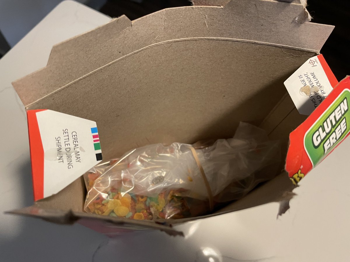 LloydApproved's tweet photo. There’s only one way to open a box of Fruity Pebbles, and that’s destroying the shit out of it.  Don’t worry, I rubber banded the cereal. https://t.co/mBQdpgCvPc