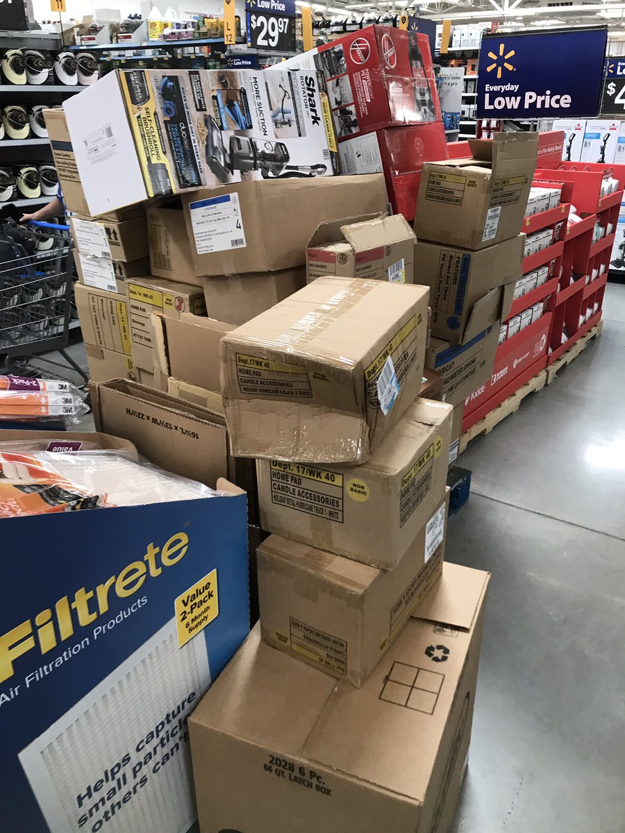 WilliamBraddock's tweet photo. Are these aisles handicap accessible?  Is this a safe shopping environment with stacked boxes everywhere, employees cutting open boxes, and pallet jacks in the aisles? https://t.co/D1mr5JFpNS