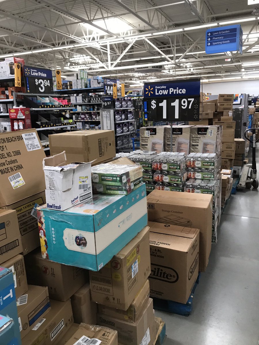 WilliamBraddock's tweet photo. Are these aisles handicap accessible?  Is this a safe shopping environment with stacked boxes everywhere, employees cutting open boxes, and pallet jacks in the aisles? https://t.co/D1mr5JFpNS