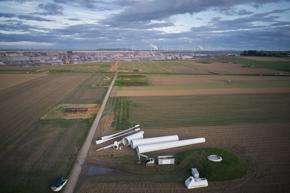 AlleDoerfer's tweet photo. Germany is tearing down wind turbines to make way for brown coal. No joke. 
The coal from this mine will be 6x more than a 1.5° budget would allow. Also no joke.
This is a policy pushed forward by the Green Party leaders. Still no joke.

📷 Christoph Schnüll https://t.co/gdDdN3Vi0m