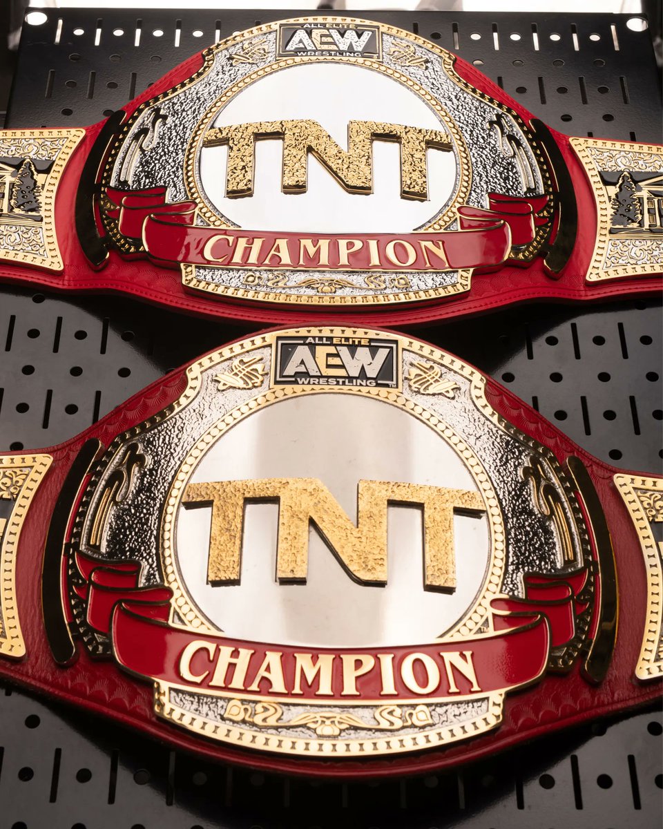 AEW's tweet photo. The real TNT Championship belt &amp; the replica! Which is which? This is the final call to pre-order your TNT Championship replica belt at https://t.co/XtpDuzX56R!
#AEW #AEWDynamite #AEWRampage https://t.co/uYsAiXeF8c