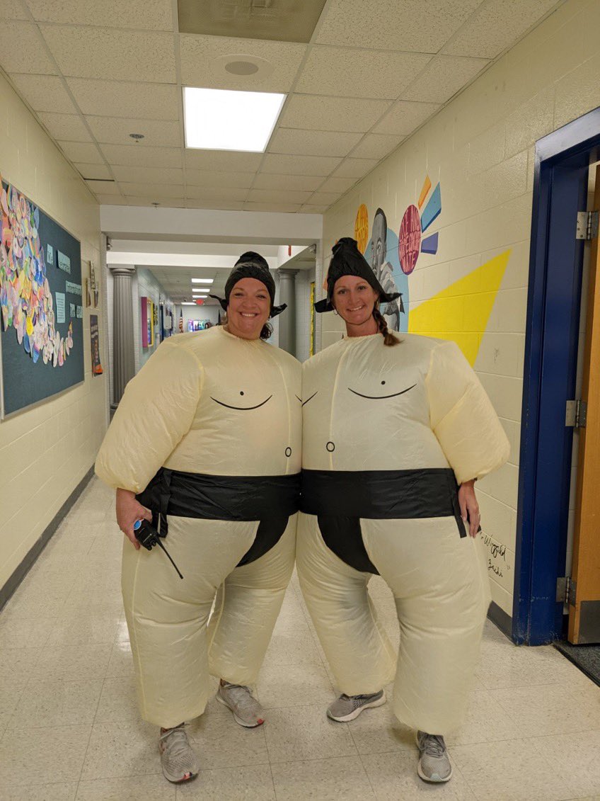 wresWildcats's tweet photo. As promised, Mrs. Matheny and Mrs. Broughton dressed up in Sumo Suits for reaching out APEX Goal of $40,000! Way to go, Wildcats! 🐾💙💛 https://t.co/w1NNVJhf3l