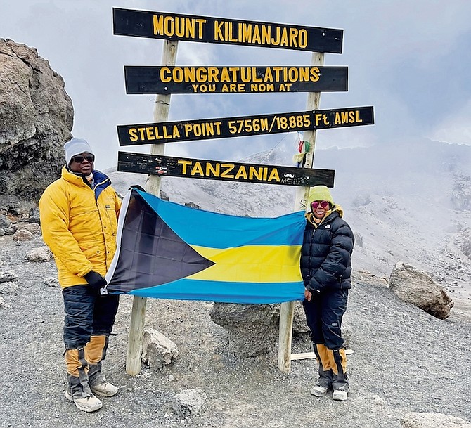 Tribune242's tweet photo. FLYING THE FLAG ON KILIMANJARO  
Bahamians Stacee Bain Crittenden and Dr Nneka Davis recently climbed Mount Kilimanjaro where Mrs Crittenden carried The Bahamas’ national flag all the way to the mountain’s summit.
https://t.co/WX0cxUgYA9 https://t.co/k6YMraYyal