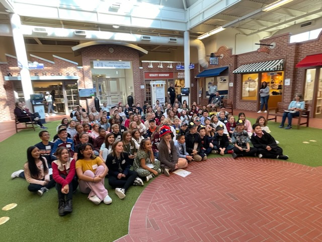 SCE_Principal's tweet photo. The SCE Young Ameritowne is up and running. This is such an AWESOME experience for our 5th grade students and teachers. Thank you @Adams12 for making sure EVERY 5th grade student in our district has access to this great learning experience. #GoEalges #MakeAProfit https://t.co/37BMownQzN