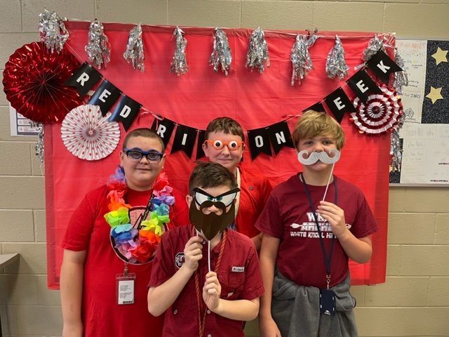 whit_farrell's tweet photo. @CSMS_Huskies kicking off #RedRibbonWeek with a fun photo booth at lunch today! ππ #CSMSRRW https://t.co/3WFYoHhqf3