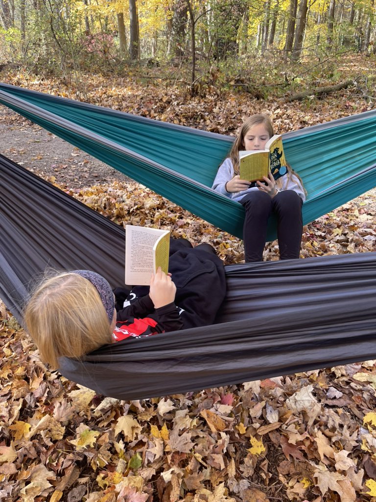 mrsjodihetman's tweet image. Nothing beats a book in a hammock! #NEST #LandLab #ELAinNature @Miss_Sokolowski