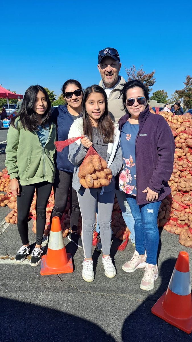 LHCCLT's tweet photo. On Saturday, LHCC families participated in our annual Community service event in support of PNP helping with 175 volunteers to bag 40,000 lbs of donated potatoes. A 10 lb bag of potatoes for those in need makes a difference when it is delivered with encouragement. https://t.co/wrG3FxRSLr