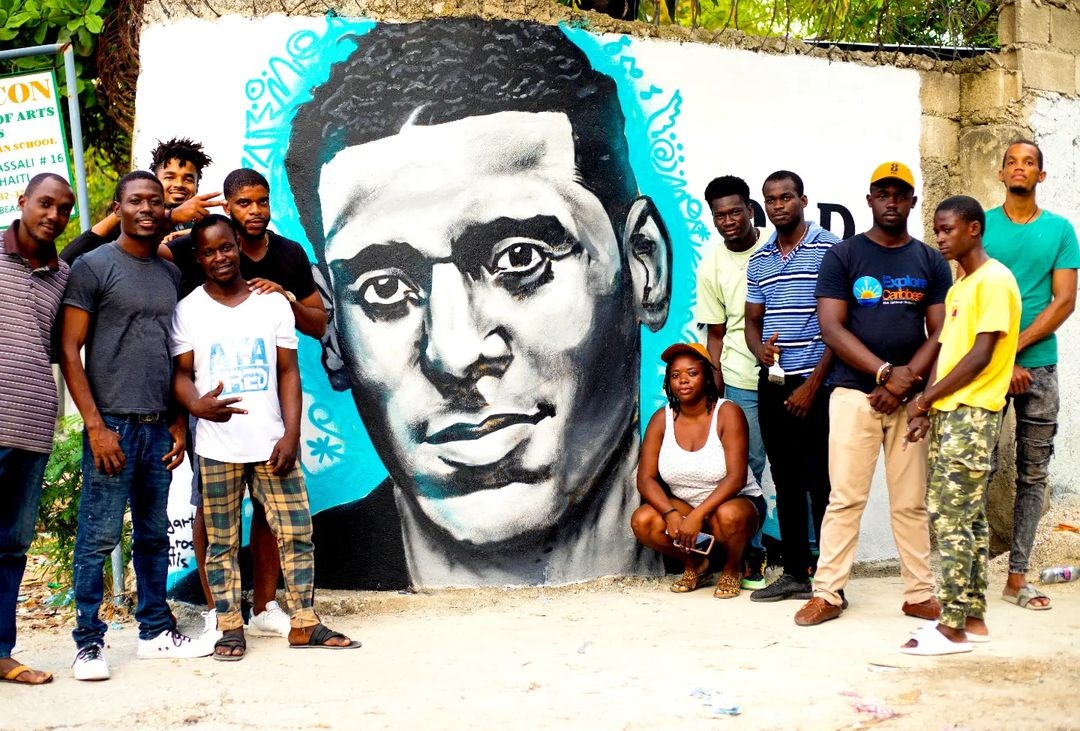 LunionSuite's tweet photo. Haitian artist pays tribute to Mikaben.
"Yesterday in honor of Mikaben in Haiti, in collaboration with artists #belatis &amp; #art_rosh &amp; community in the area where Mika &amp; his family live. We create this mural, as a symbolic gesture to the sudden passing of this musical legend." https://t.co/LQQFMbXO3O