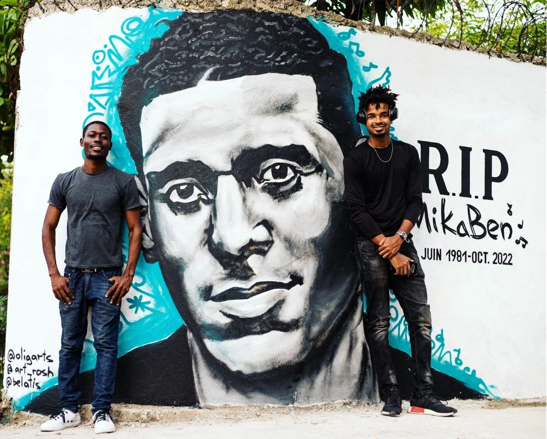 LunionSuite's tweet photo. Haitian artist pays tribute to Mikaben.
"Yesterday in honor of Mikaben in Haiti, in collaboration with artists #belatis &amp; #art_rosh &amp; community in the area where Mika &amp; his family live. We create this mural, as a symbolic gesture to the sudden passing of this musical legend." https://t.co/LQQFMbXO3O