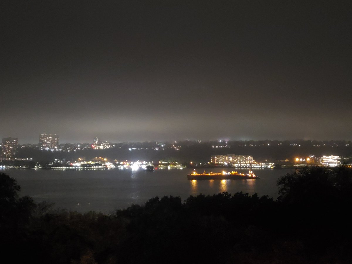 Cargo ships are pretty at night, waiting for their turn to offload tomorrow.