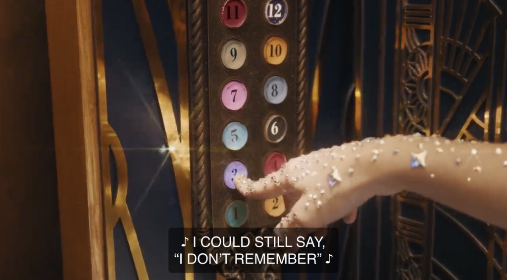 SwiftNYC's tweet photo. Taylor Swift’s necklace and the elevator in #BejeweledMusicVideo resonate with colors of her album, also indicating that Speak Now is the next Taylor’s Version re-recorded album! 

Enchanted also was playing instrumental in the beginning of the music video! @taylornation13 🤔 https://t.co/2G05BzlxDc