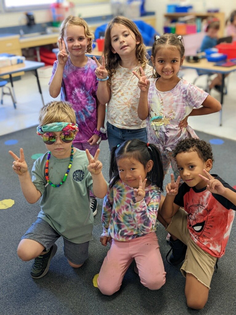 sdedragons's tweet photo. We’re all saying “Peace Out Drugs” on this first day of #redribonweek. Today we wore our hippiest clothes to remind us to #celebratelifelivedrugfree. #tiedye #hippies #peaceout #dressupdays https://t.co/tsHpOrac5U