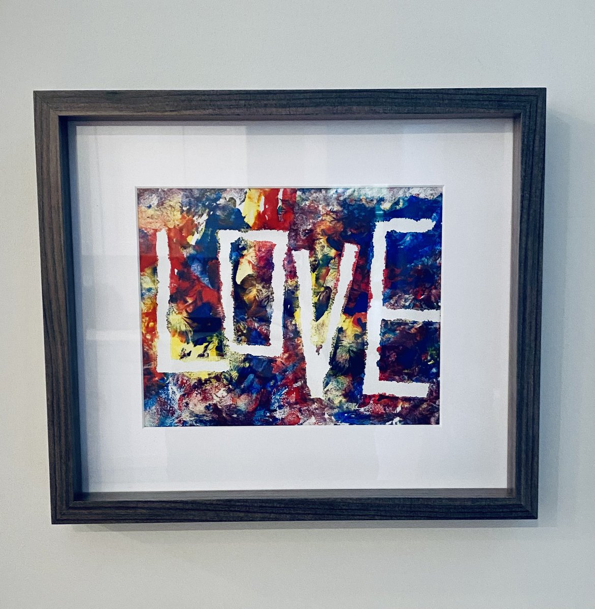 Excited to finally hang this beautiful piece of art in our home. My son made this with his amazing teachers @MsMeaghanPreK and Ms. Justice last school year. Makes me smile each time I look at it. 💙❤️💛