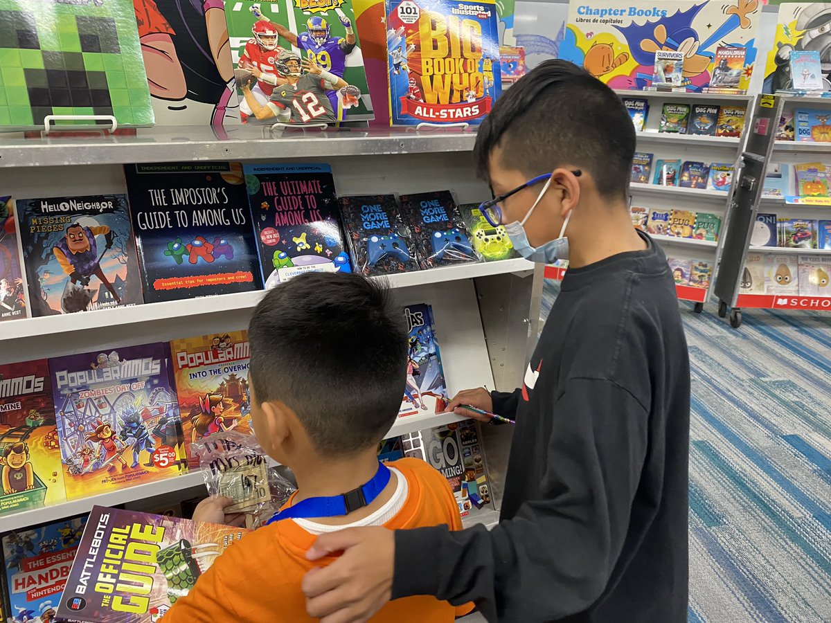 amberkim21's tweet photo. Love that my fifth graders will jump at any opportunity to help out!! Here they are helping kindergarteners buy books and write their wish lists from the @Scholastic book fair 😊 @ccsd21twain https://t.co/s3UhIwUEGf
