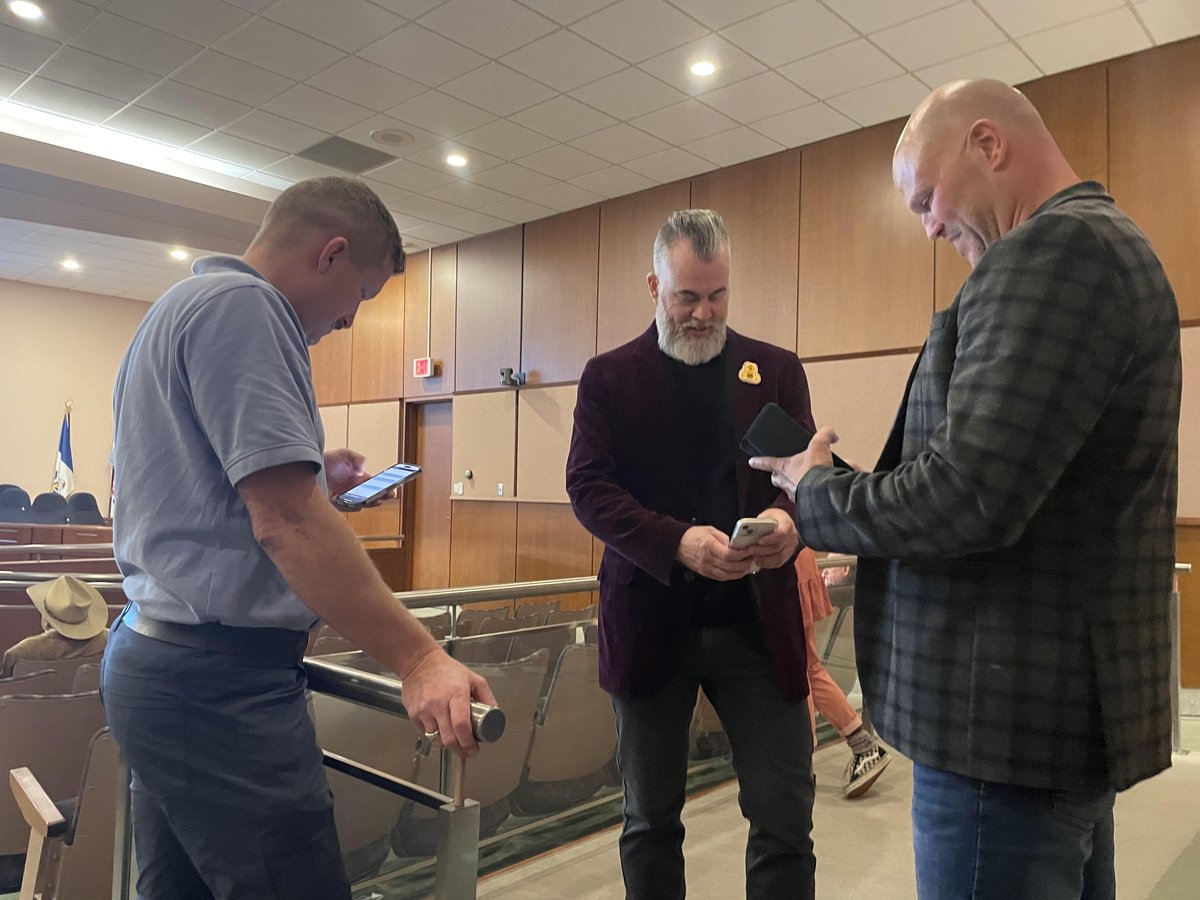 Live from Sarnia city hall: candidates Robert Dickieson, Brian White and CEO Chris Carter huddle with their phones to watch the results as they come in. #SarniaVotes