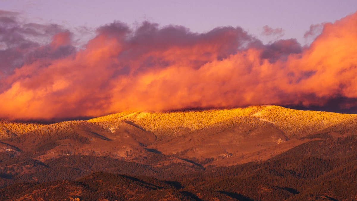 Sunset tonight… Tesuque Peak (12,000’ ish) is covered in snow.