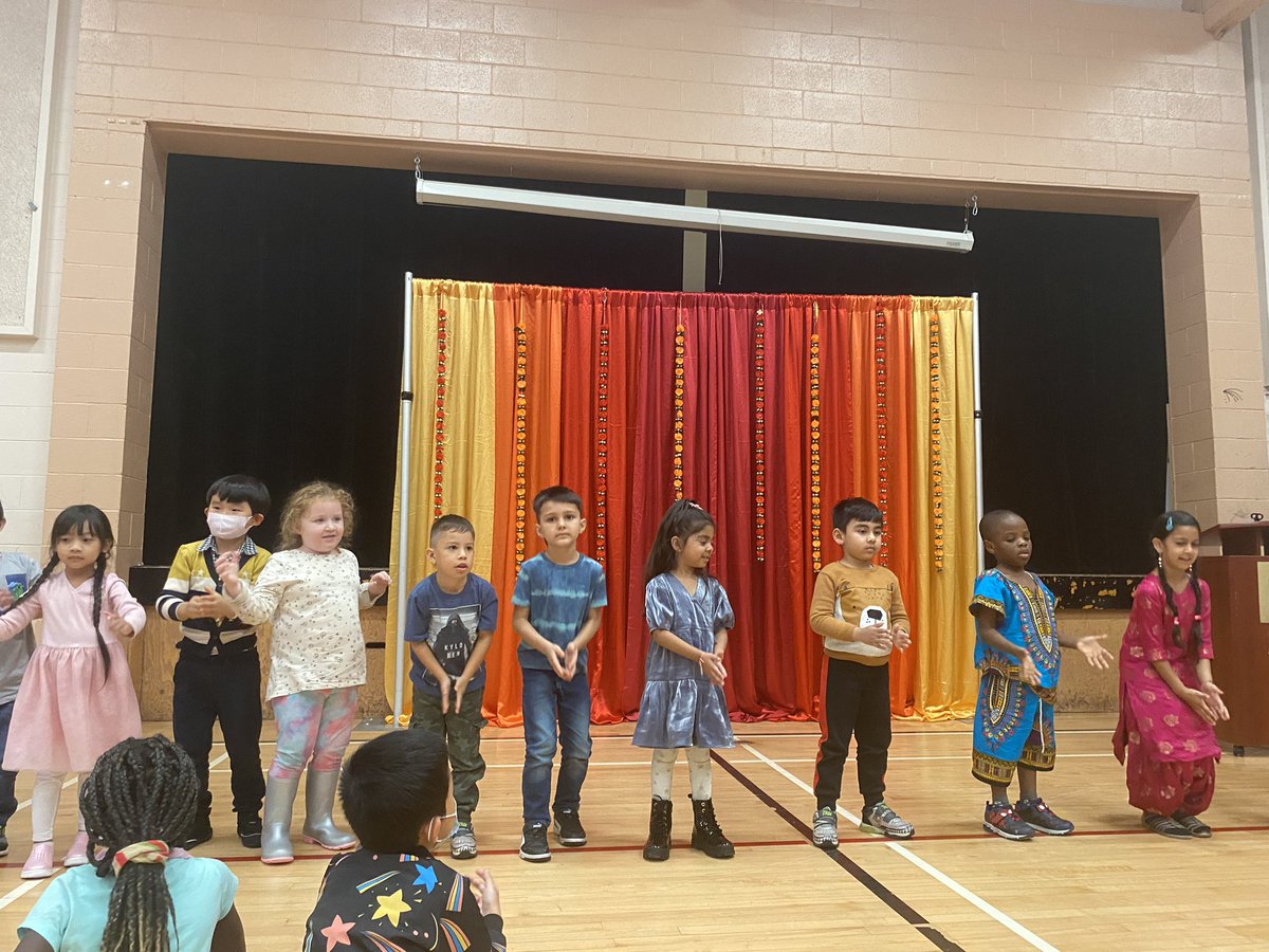 ahpmatthew's tweet photo. Diwali was celebrated enthusiastically by staff, students and families who joined us for an incredible assembly. Students painted diyas, made a rangoli and enjoyed samosas! #surrey_schools #Diwali https://t.co/izXZ3B4Tta