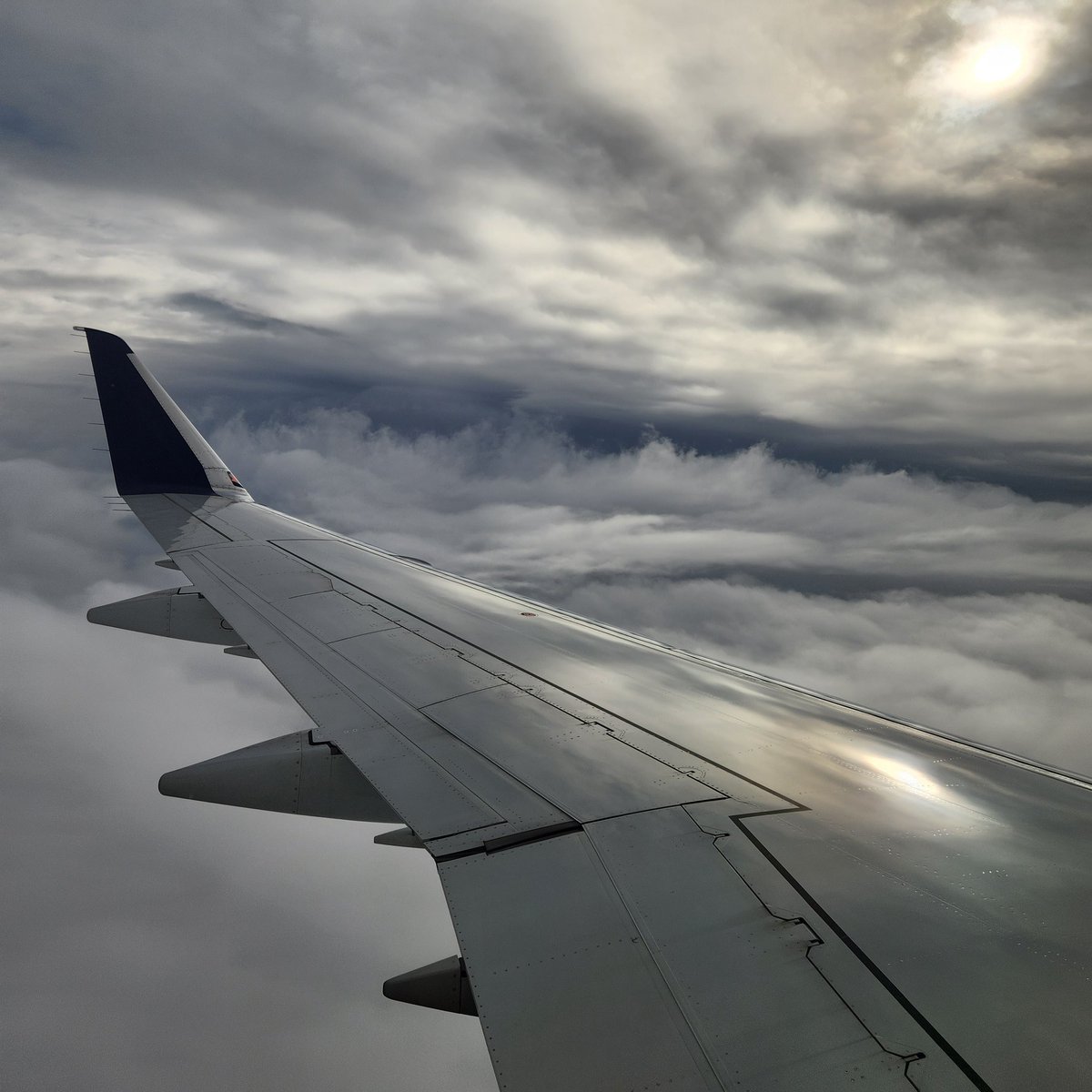 ASteingisser's tweet photo. Not many landscape views on my way home from #NACIS2022, but I'll take clouds any day. Also, embarrassingly, my first use of @flyovergeo and I love it! I always need more information about what I'm seeing and where I'm at.  #windowseatforever https://t.co/Bn1AE3TUMH