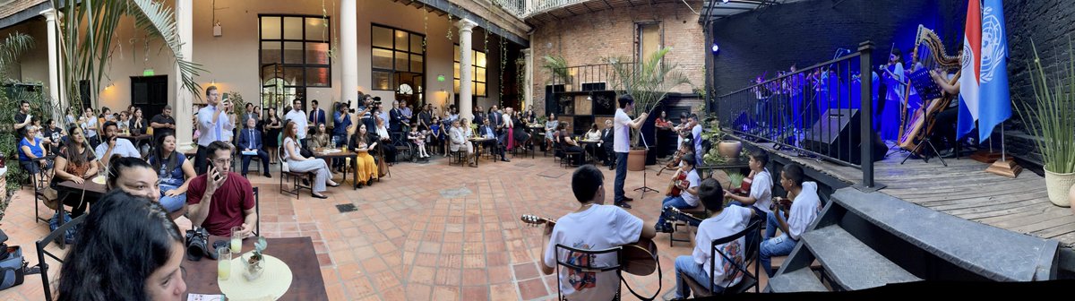 ONUParaguay's tweet photo. Hoy celebramos el aniversario 77 de la creación de las Naciones Unidas con los jóvenes y niños de la Orquesta Melodías de la Chacarita. 

Disfrutaron del concierto autoridades nacionales, diplomáticos, funcionarios y amigos de la ONU. 

¡Gracias a todas y todos! https://t.co/g2KrPYowq1