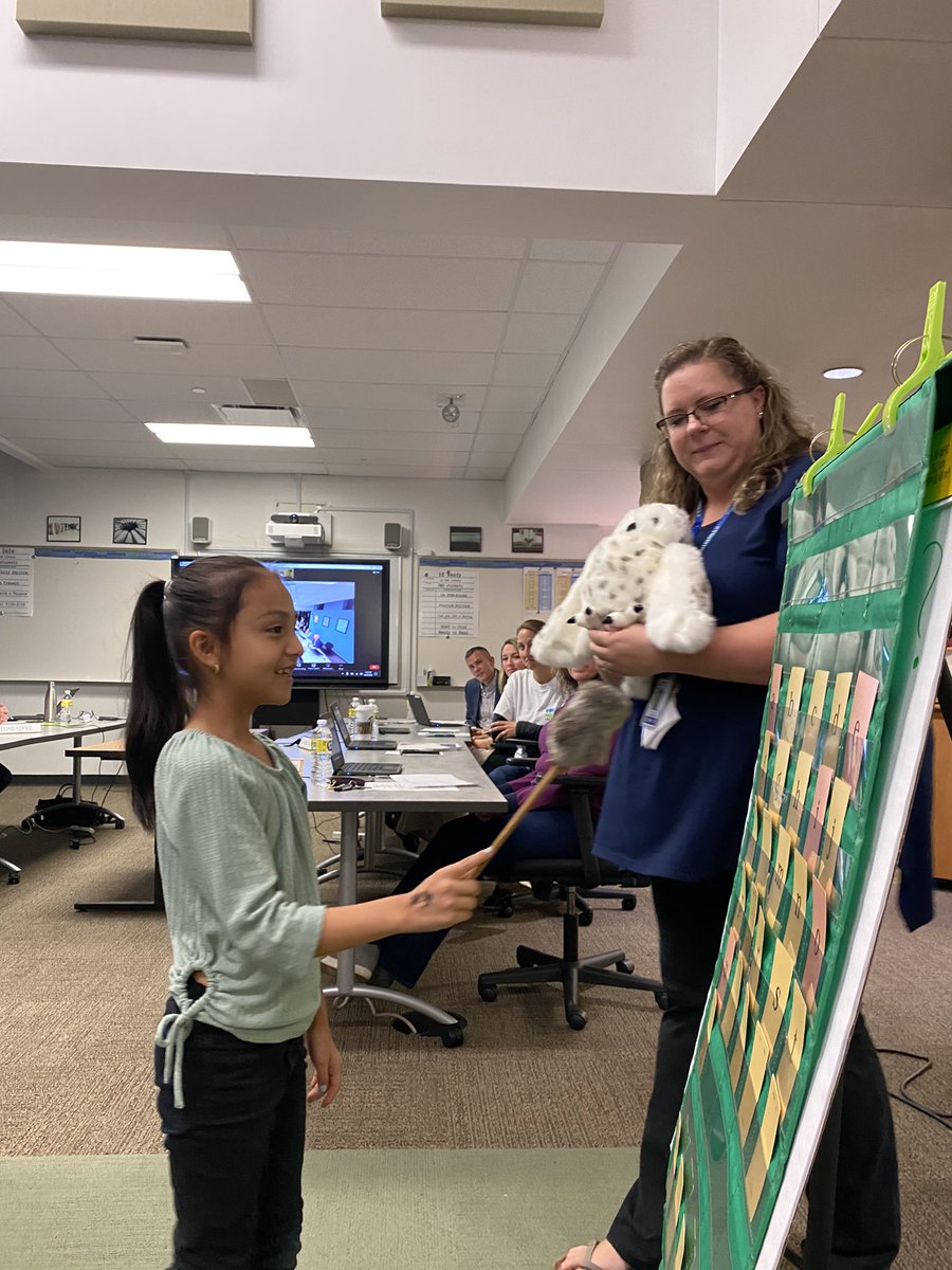 HodgkinsSchool's tweet photo. So proud to have our amazing students & teachers present tonight to our @dist105 BOE! @ConradyKinder EL teacher Krystal Schmidt #lessonsharing #wilsonfundations #GoBulldogs https://t.co/L4Di0mToR8