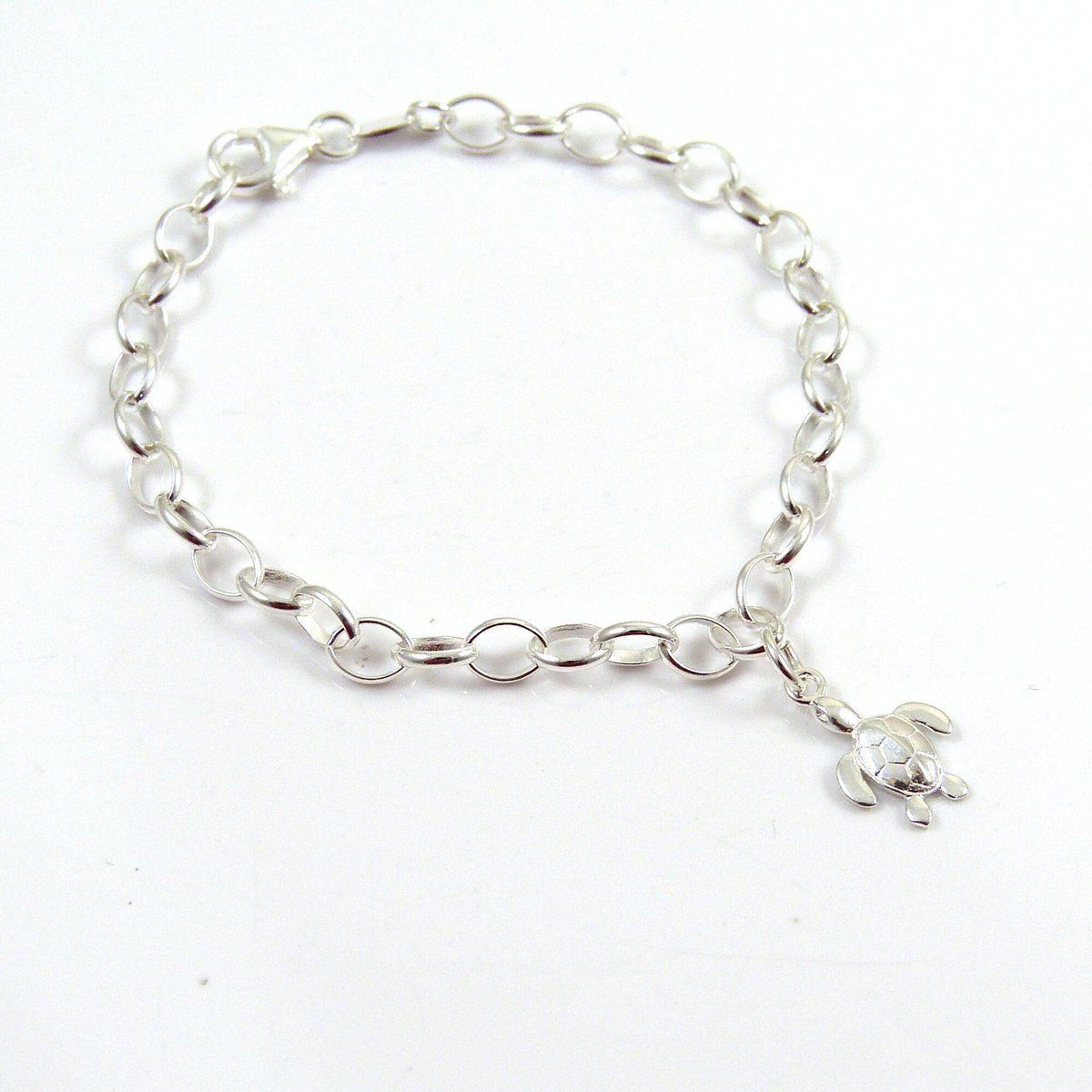 TheStrandline's tweet photo. Sterling Silver Turtle Bracelet, Silver Bracelet, Sterling Silver Bracelet, Turtle Bracelet, Nautical Jewellery https://t.co/MIkCCTaJAB #shopindie #UKGiftAM #HandmadeHour #northumberland #EarlyBiz #supportsmallbusiness #thestrandline #UKGiftHour #CharmBangle https://t.co/RpJtXYqLxE