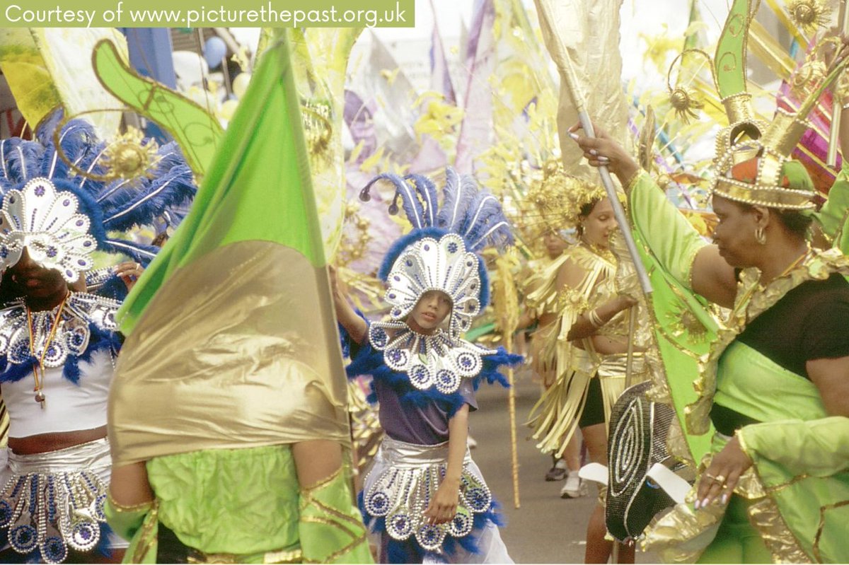 DerbyshireDRO's tweet photo. At this time of the year, these shorter days can seem a bit dark and gloomy. So, to brighten up your day hereβs an injection of sparkle and fun as we look back at the West Indian Carnival parade in Derby in 2002. #PhotoFriday #BlackHistoryMonth #EYACommunity https://t.co/n4GLqxxDOK
